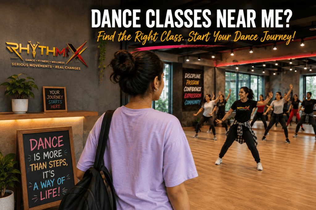 Dance classes near me with a beginner watching an energetic group class inside a modern dance studio